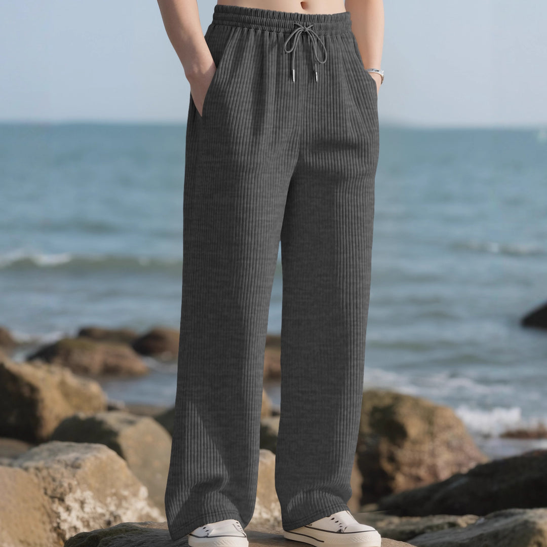 Men's straight cut corduroy velour pants with drawstring waistband, metal drawstring ends, and deep side pockets StylebySassy