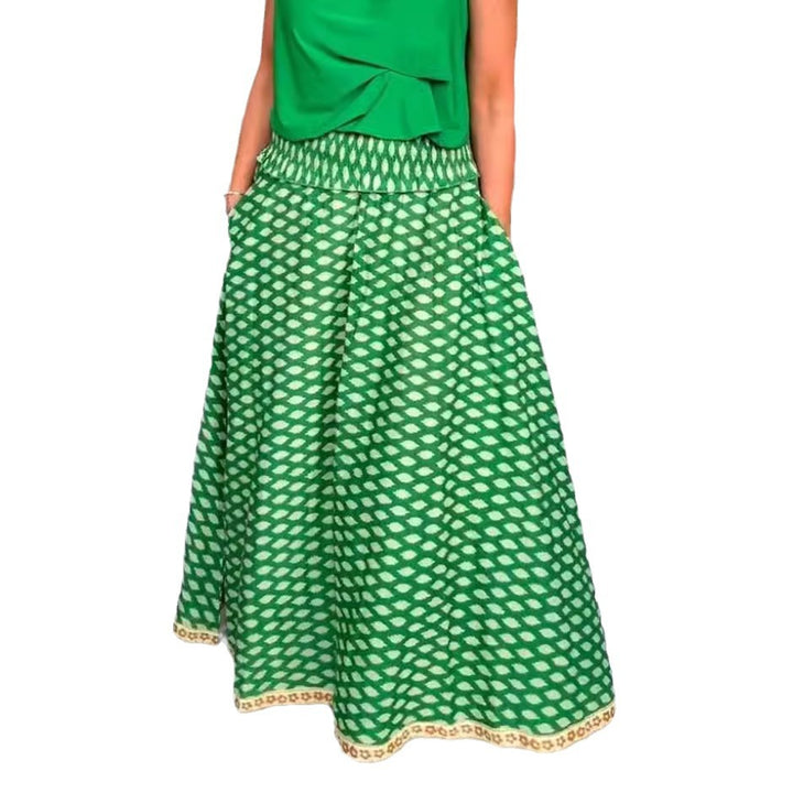 Women's two-piece halter neck set with gathered stand collar and patterned maxi skirt with elastic smocked waistband StylebySassy