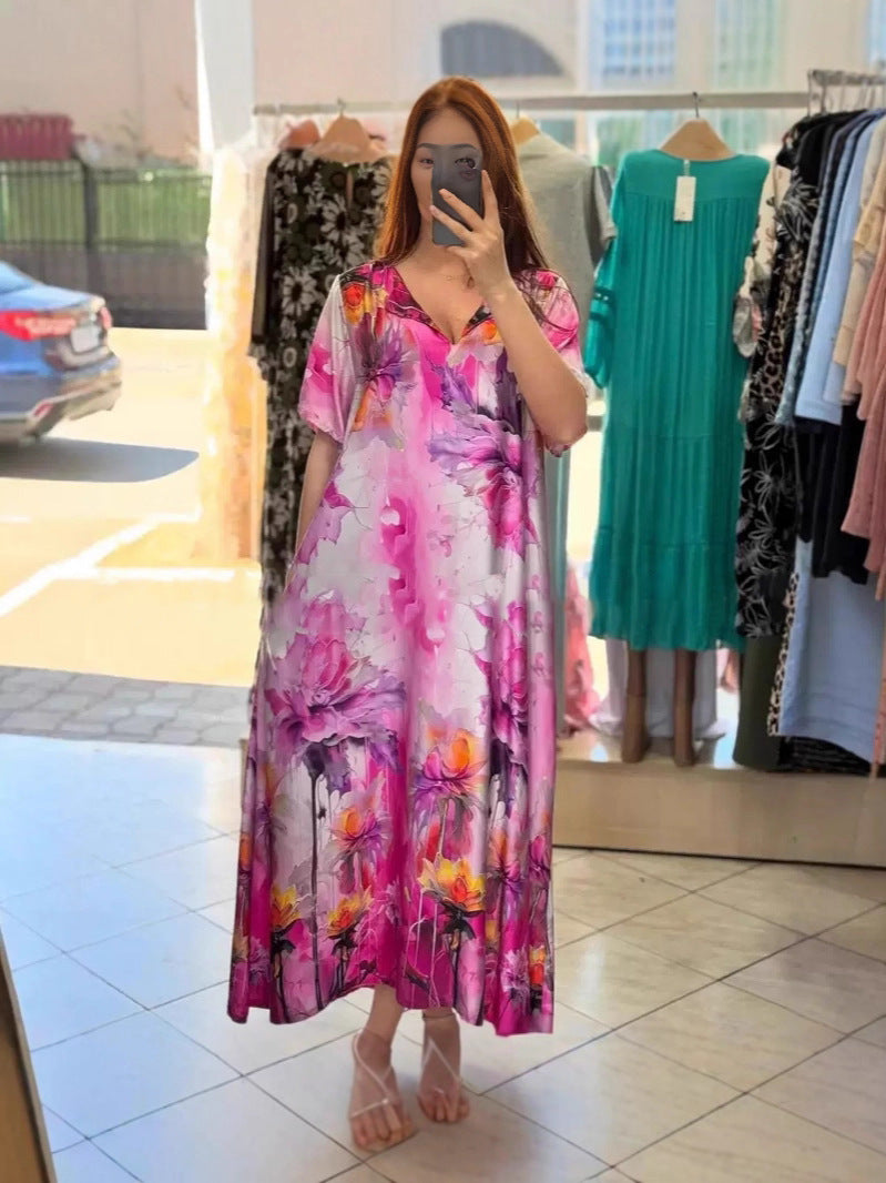 Women flowing maxi kaftan dress with V-neck and large watercolor floral print StylebySassy