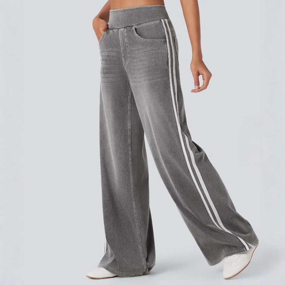 Women's casual wide jogging pants in denim look with elastic comfort waistband, contrasting side stripes and pockets StylebySassy