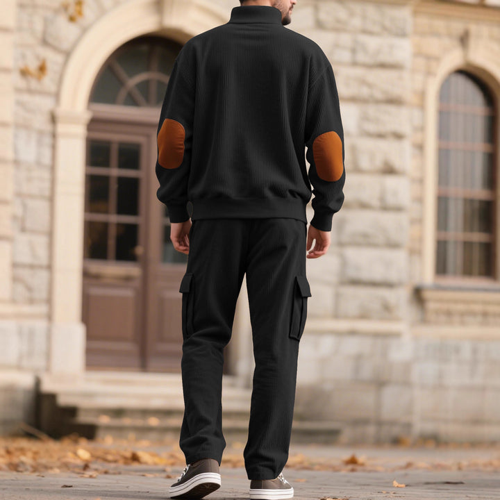 Men's structured turtleneck pullover with stand-up collar, press stud placket, and velour elbow patches StylebySassy