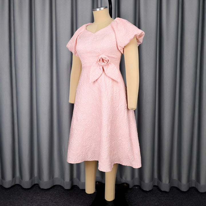 Ladies elegant dress with peplum, floral applique and puff sleeves StylebySassy