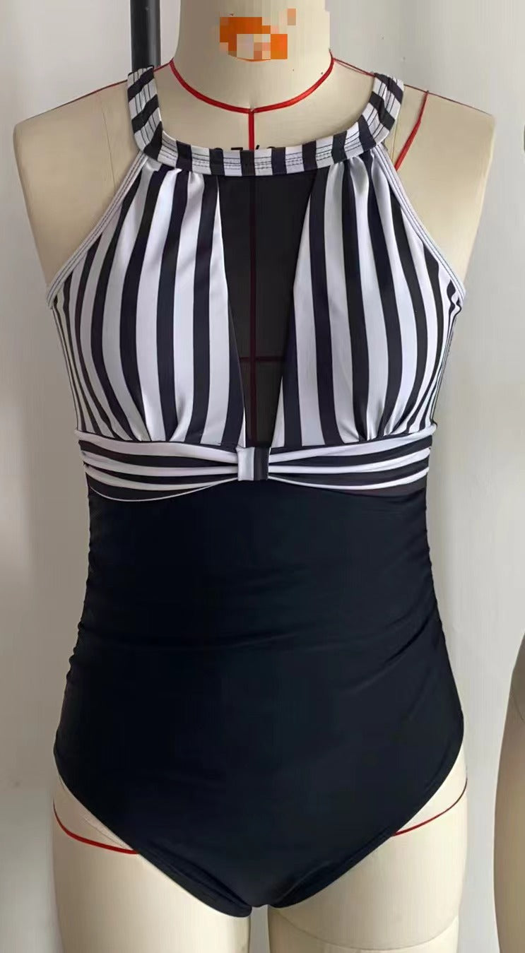 Women's Sporty One-Piece Swimsuit with Sophisticated Mesh Detail StylebySassy
