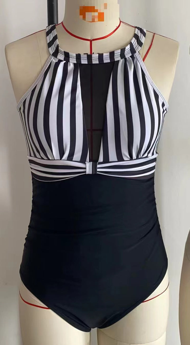 Women's Sporty One-Piece Swimsuit with Sophisticated Mesh Detail StylebySassy