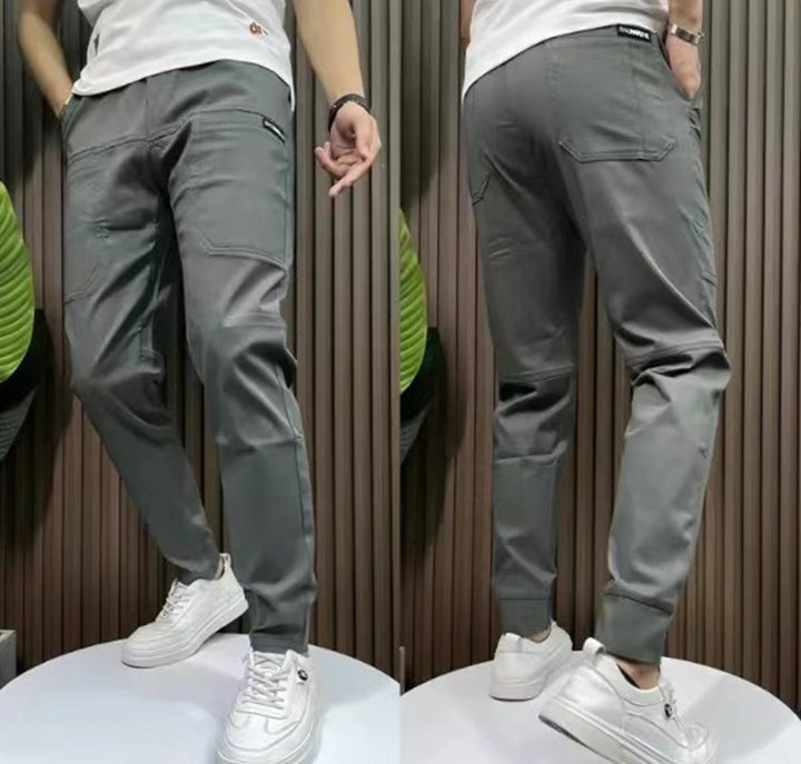 Men's sporty cargo jogger pants with elastic waistband, drawstring, and tapered leg hem StylebySassy