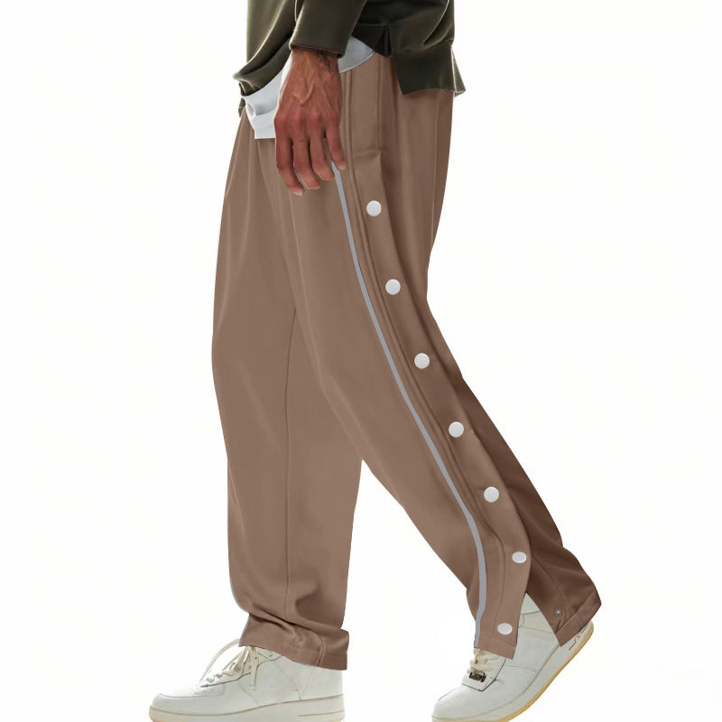 Men's wide training pants with side snap button placket, contrast stripes, elastic waistband, and straight leg StylebySassy
