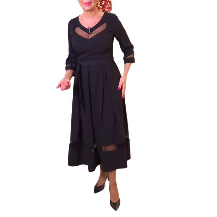 Women's fitted midi dress with transparent mesh inserts, tie belt and feminine A-line StylebySassy