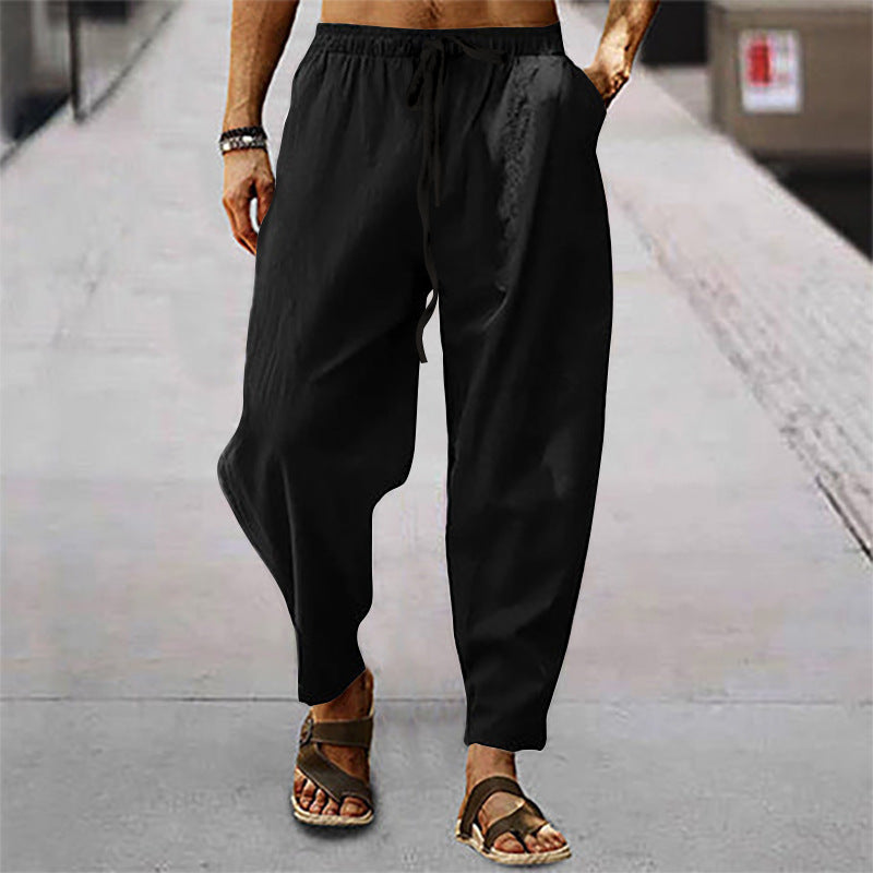 Men's relaxed summer slouch pants made of linen blend with elastic waistband and tapered ankle cuffs StylebySassy