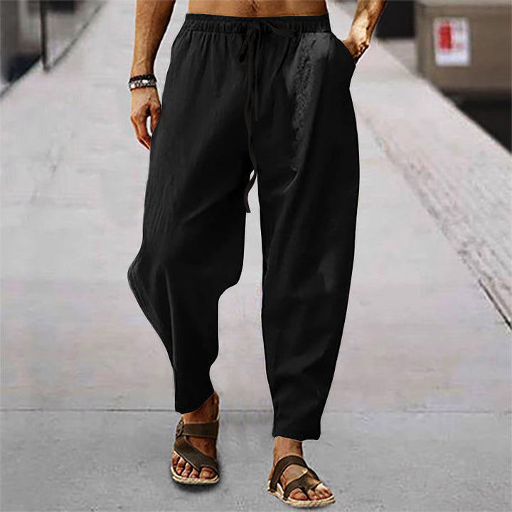Men's relaxed summer slouch pants made of linen blend with elastic waistband and tapered ankle cuffs StylebySassy