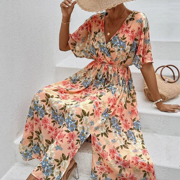 Women's floral V-neck tie dress with fitted belt and side leg slit StylebySassy
