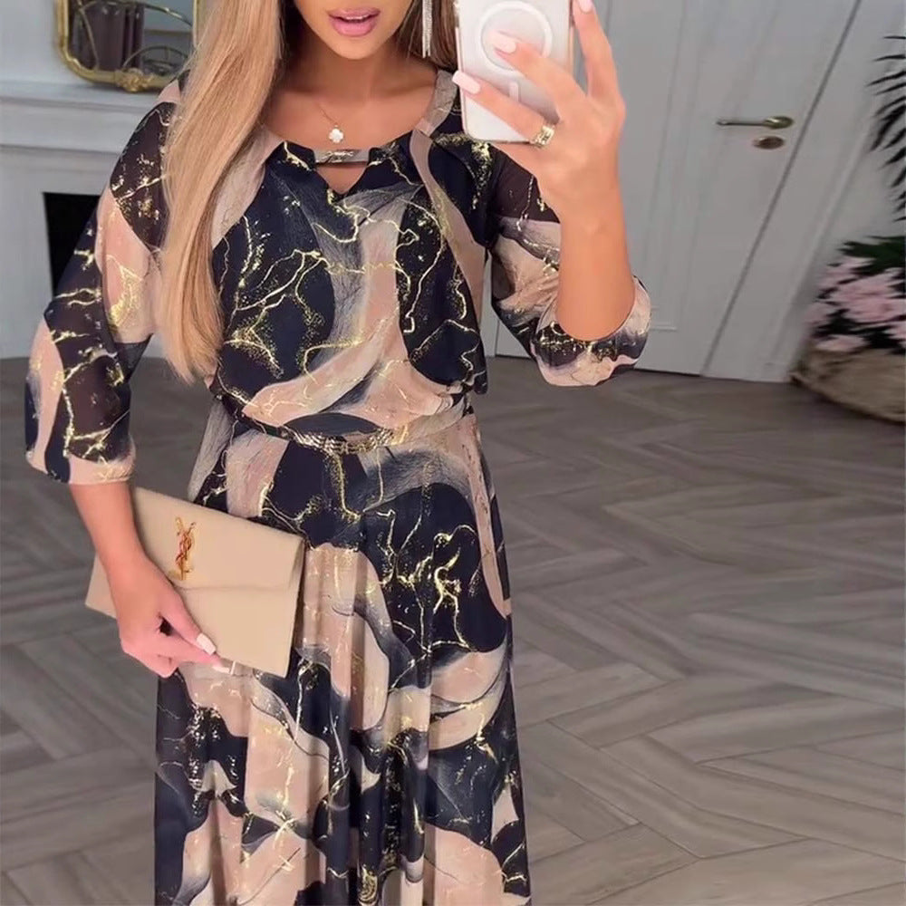 Women's floor-length chiffon dress with fitted tie belt, three-quarter sleeves and elegant watercolor print StylebySassy