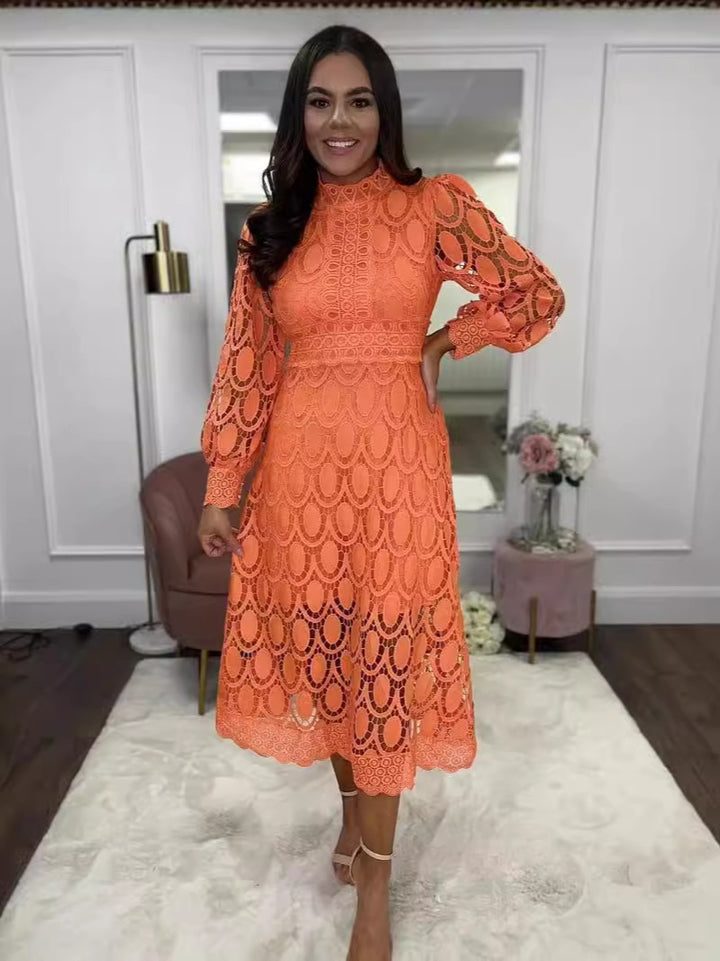 Women's crocheted midi dress with stand-up collar, transparent lace sleeves, and fitted A-line StylebySassy