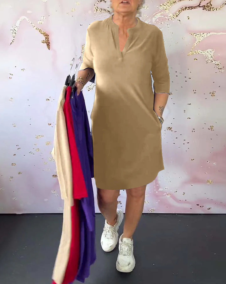 Women's knee-length casual jersey dress with stand-up collar and V-neck StylebySassy