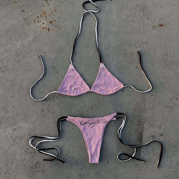 Women's seductive bikini set with unique accents StylebySassy