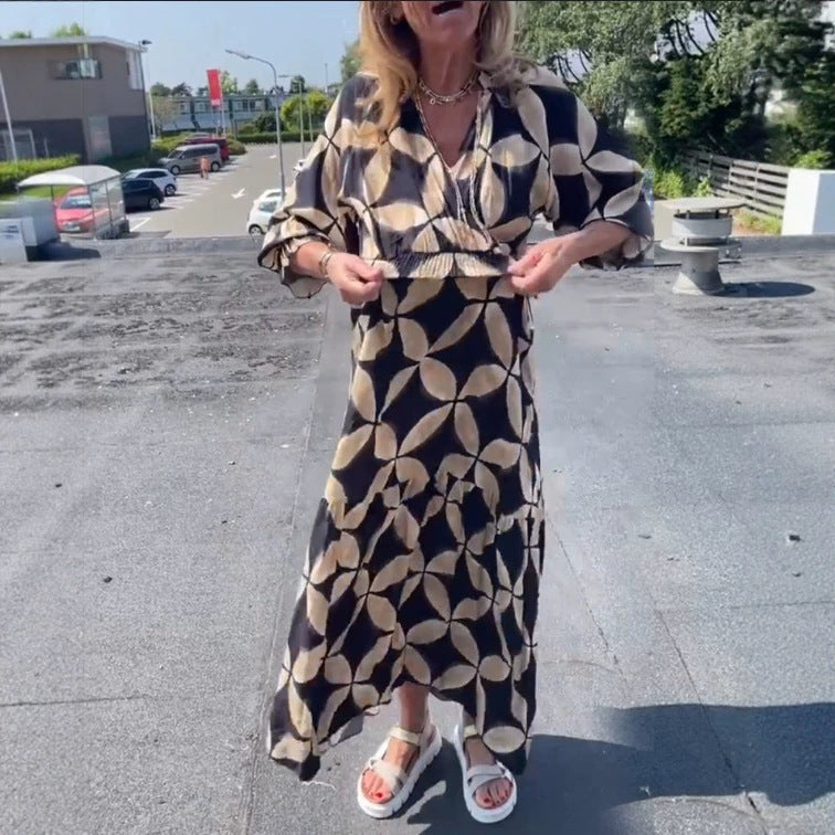 Women's maxi dress with geometric all-over print, smocked waist and ruffled tiers StylebySassy