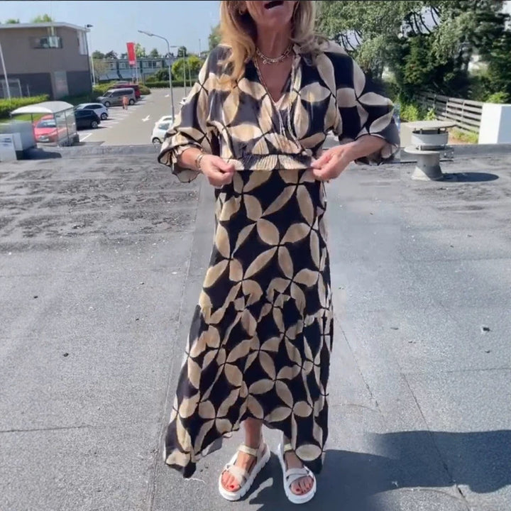 Women's maxi dress with geometric all-over print, smocked waist and ruffled tiers StylebySassy