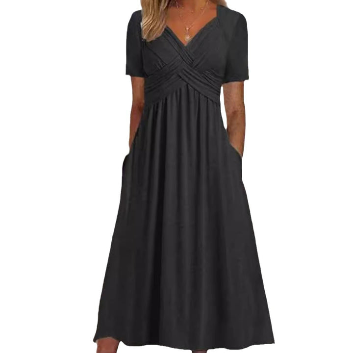 Women's flowing maxi dress with crossed yoke V-neck short sleeves and side pockets StylebySassy
