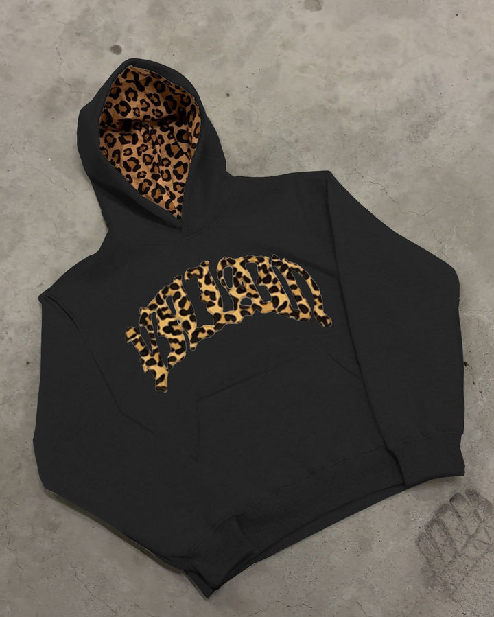 Women's high-cut jogging pants with flared leg, elastic ruffled waistband and leopard stitch detail StylebySassy