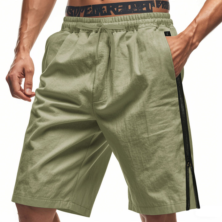 Men's lightweight training shorts with elastic drawstring waistband, side ventilation zippers, and slash pockets StylebySassy