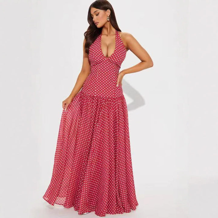 Ladies long halter dress with deep V-neck, tailored empire seam and flared layered skirt StylebySassy