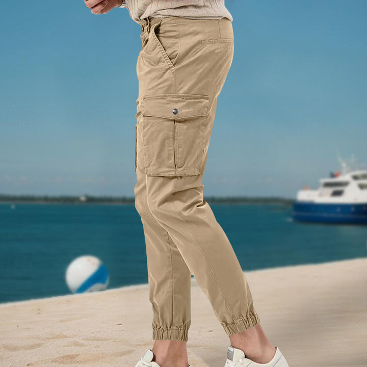 Men's tapered cargo pants in work look with patch pockets and elastic ankle cuffs StylebySassy