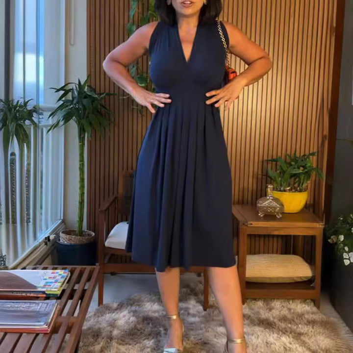 Women's sleeveless V-neck midi dress with underbust seam and flattering pleated skirt StylebySassy