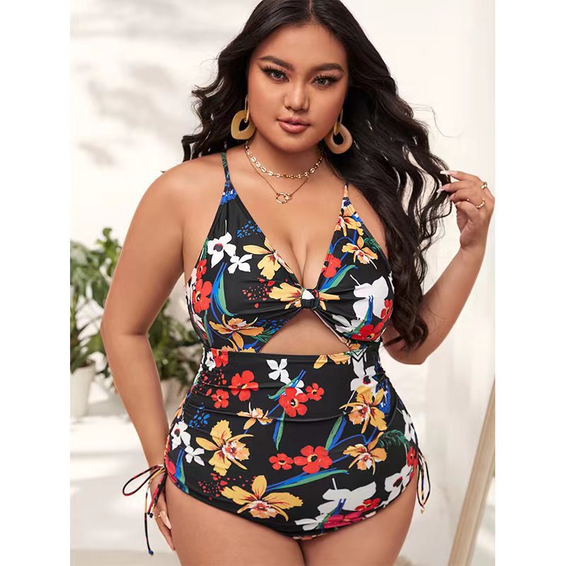 Women's one-piece swimsuit with trendy cut-out and colorful geometric design StylebySassy