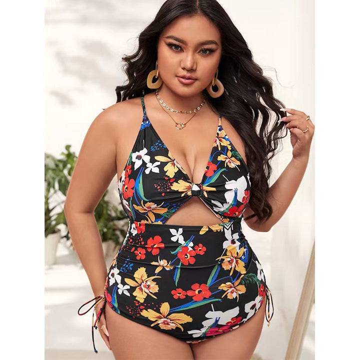 Women's one-piece swimsuit with trendy cut-out and colorful geometric design StylebySassy