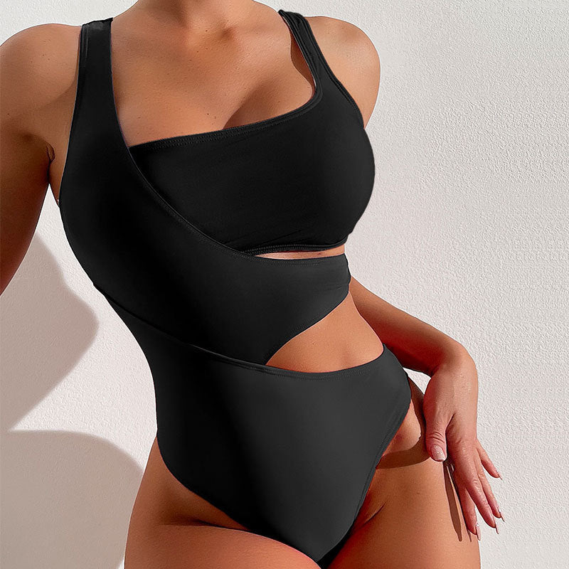 Women's one-piece swimsuit with asymmetric design and colorful contrast areas StylebySassy