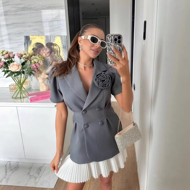 Ladies elegant blazer with puff sleeves and floral detail StylebySassy