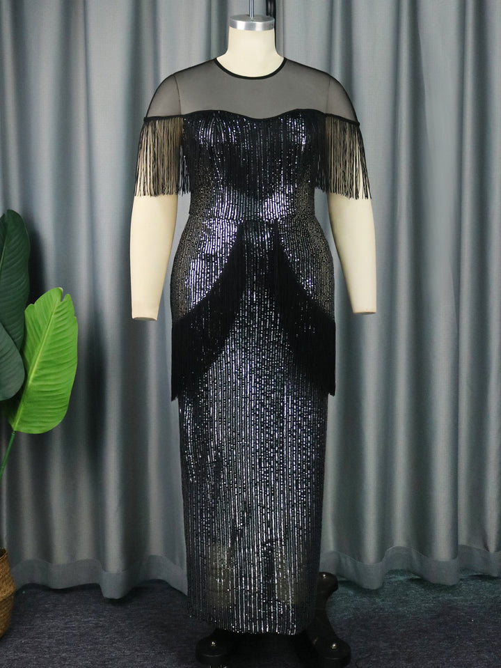 Women glamorous evening dress with fringes and glitter details StylebySassy