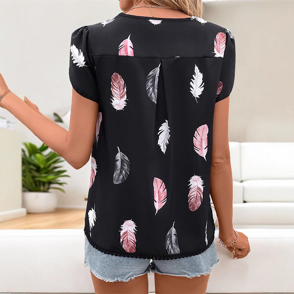 Women's airy V-neck blouse with feather print, decorative button placket and lace edge StylebySassy
