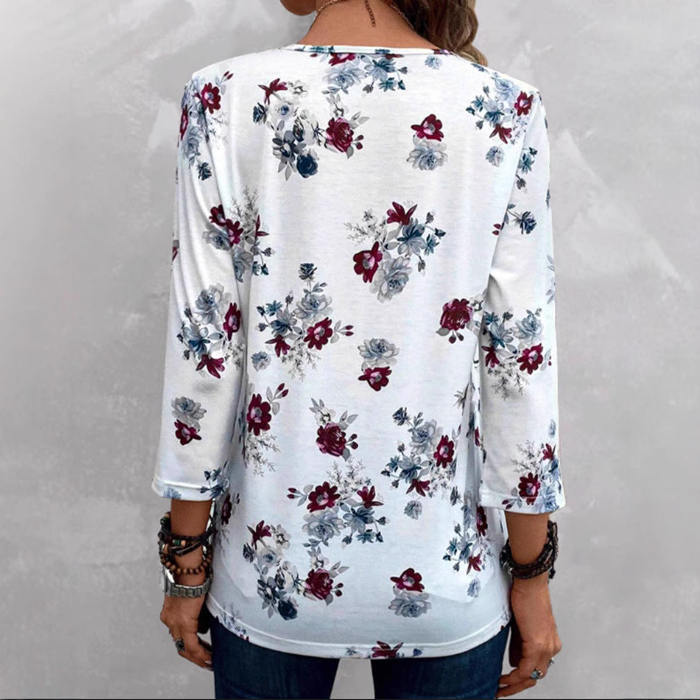 Women's floral tunic blouse with pleats and decorative button placket StylebySassy