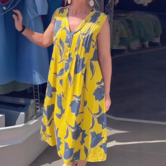 Women’s casual V-neck midi dress with bust yoke, vertical pleats, and decorative button placket StylebySassy