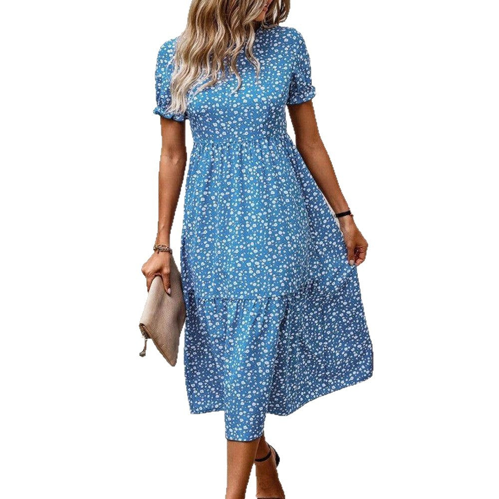 Women's airy midi dress with all-over floral pattern, gathered waist seam and short puff sleeves StylebySassy
