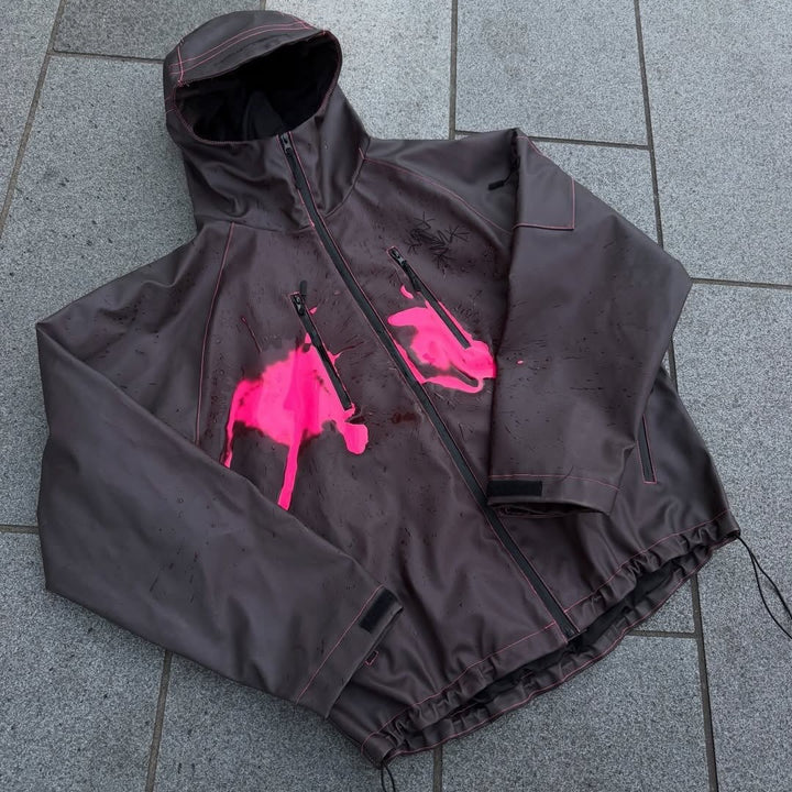Unisex nan technical rain jacket with welded seams, slanted chest zip pockets, and adjustable drawstring hem StylebySassy