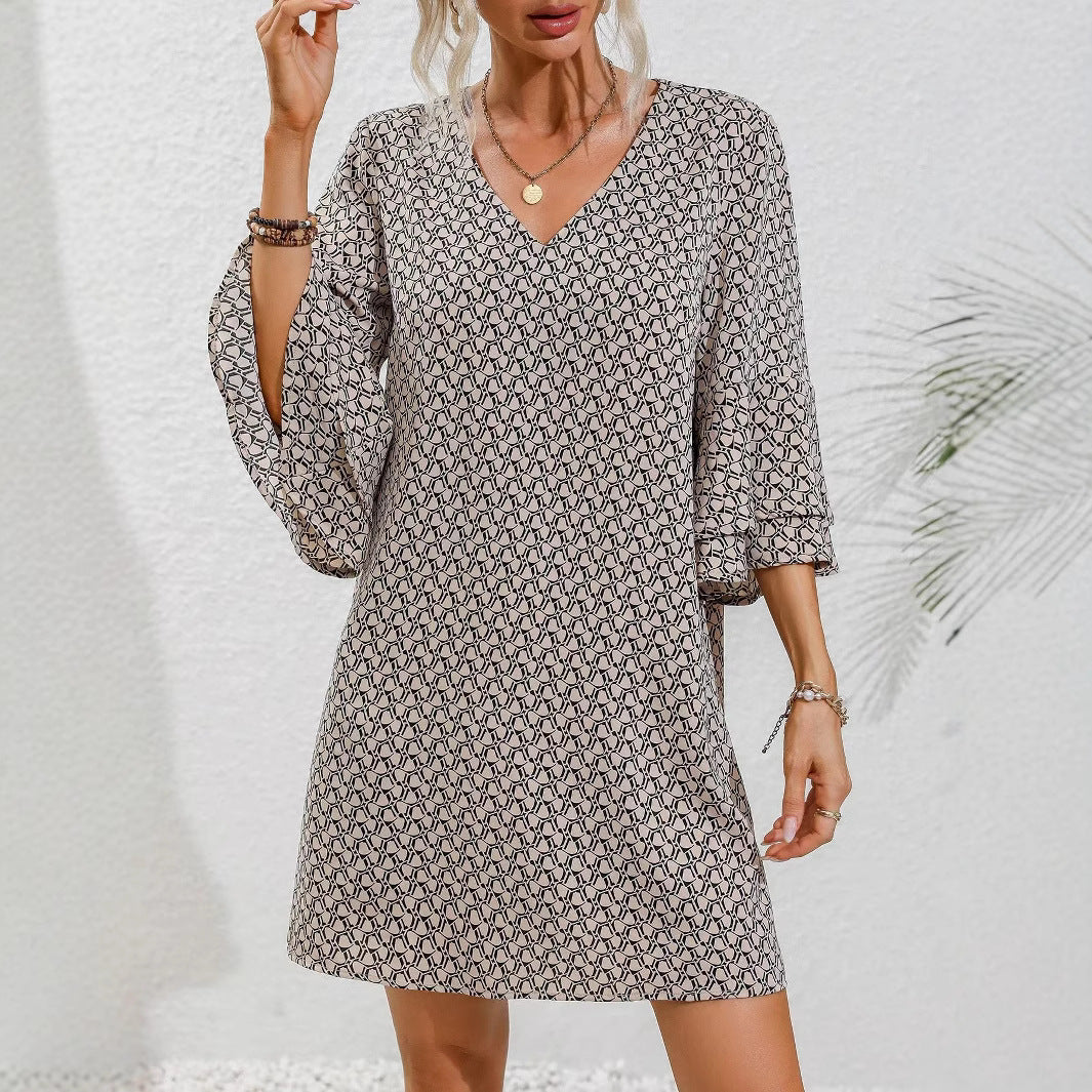 Women's flowing tunic mini dress with V-neck graphic chain pattern and double-layered bell sleeves StylebySassy