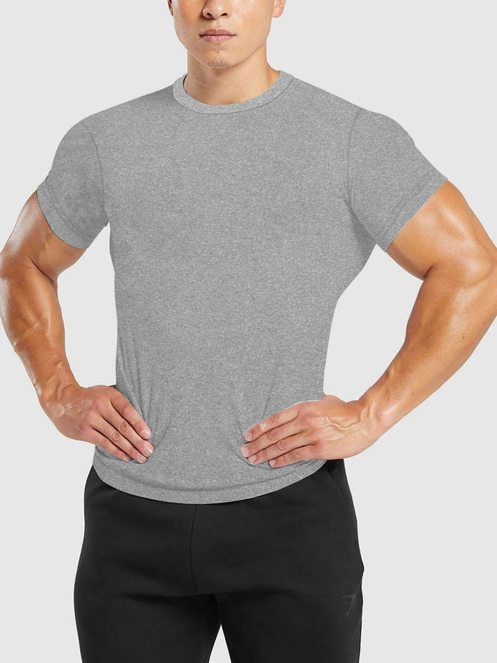 Men's slim fit round neck performance shirt with elastic side wedge and flat seams StylebySassy