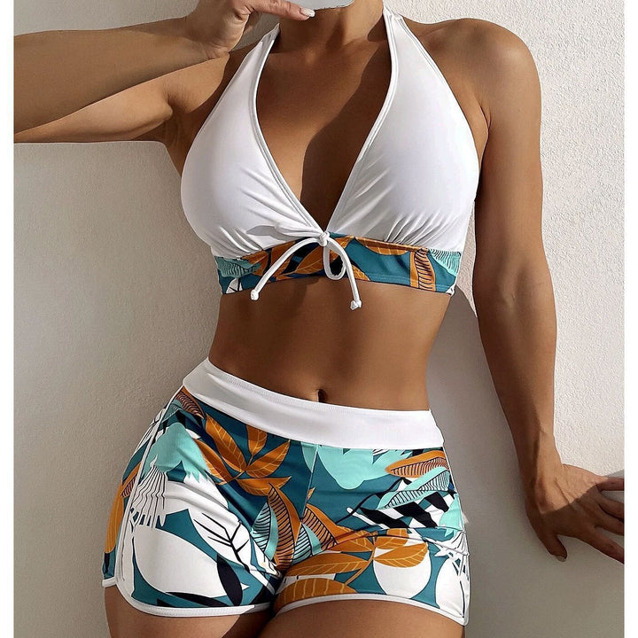 Women's bikini set with sporty high-waist cut and playful floral pattern StylebySassy