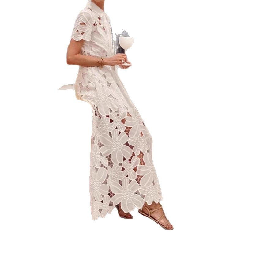 Women's flared maxi dress made of floral embroidery with a shirt collar, button placket, and tie belt StylebySassy