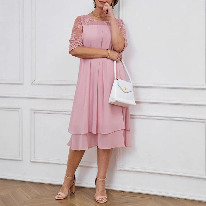 Women's A-line chiffon dress with floral embroidered lace yoke, hidden centre seam pleat, and layered ruffle StylebySassy