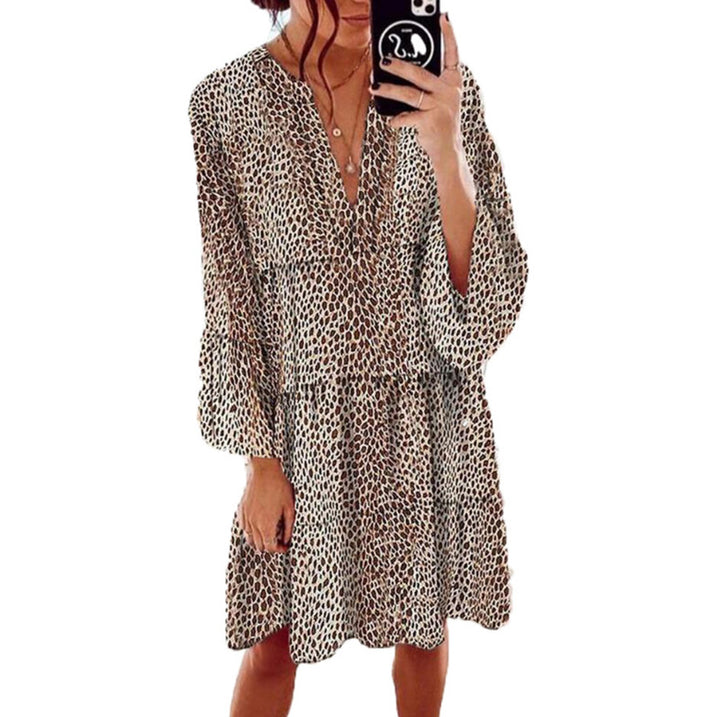 Women's cropped A-line tunic dress with deep V-neck, tiered skirt, and wide batwing sleeves StylebySassy