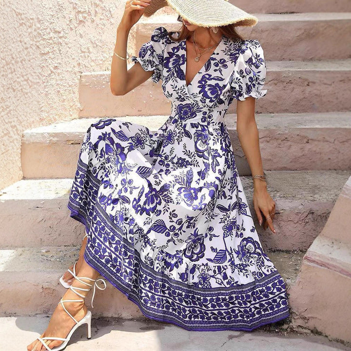 Women's tailored Boho maxi dress with wrap look V-neck puff sleeves and border tiered skirt StylebySassy