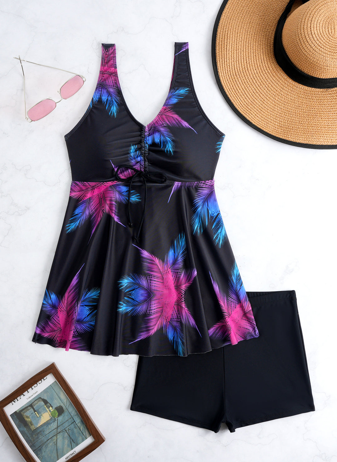 Ladies' tankini set with stylish ruffle and graphic peacock pattern StylebySassy