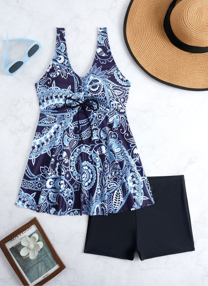 Ladies' tankini set with stylish ruffle and graphic peacock pattern StylebySassy