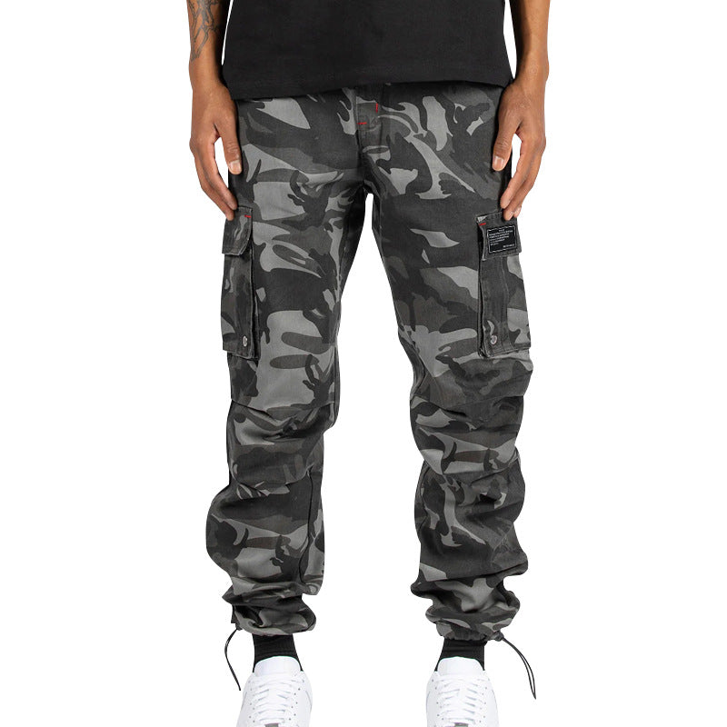 Men's multi-pocket casual trousers made of cotton twill with tapered leg and adjustable ankle drawstring StylebySassy
