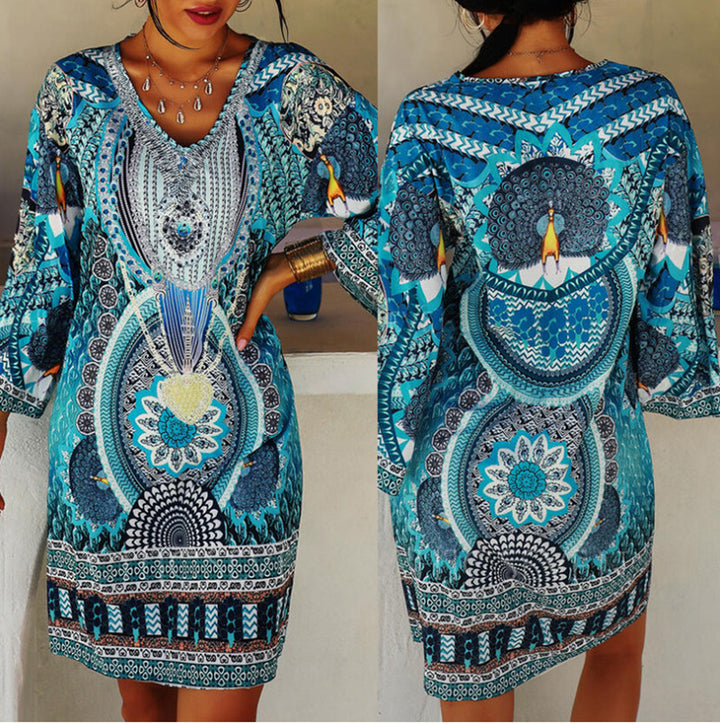 Women's short holiday tunic dress in kaftan style with V-neck and flared kimono sleeves StylebySassy