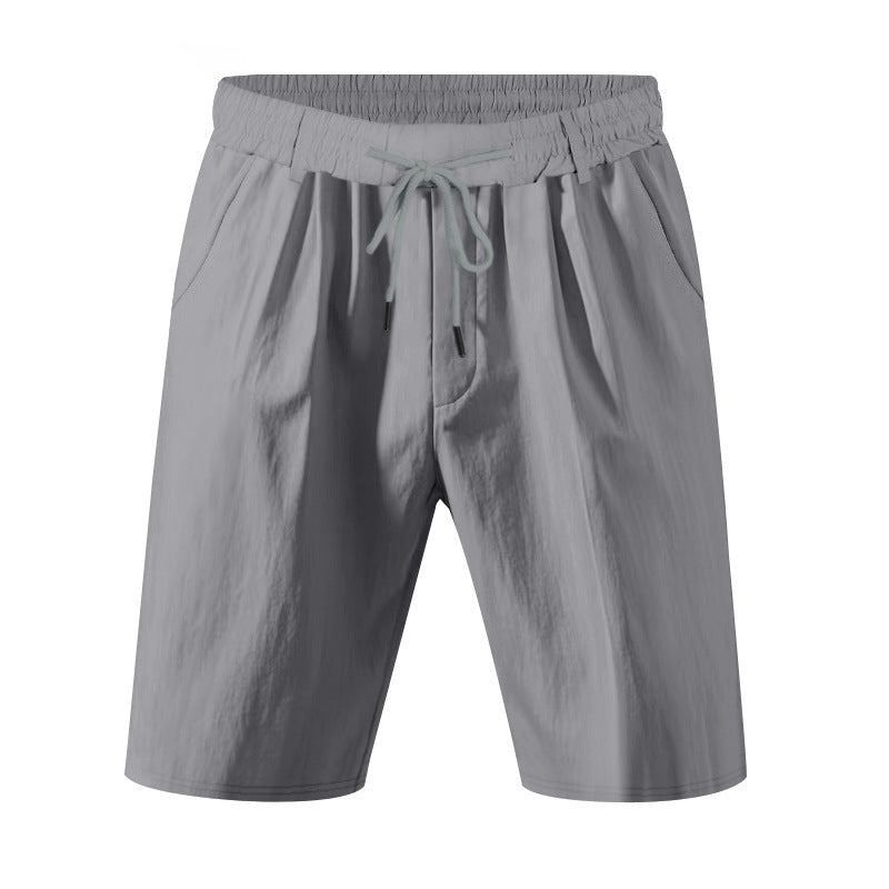 Men's knee-length lightweight functional shorts with elastic waistband, drawstring, and deep side pockets StylebySassy