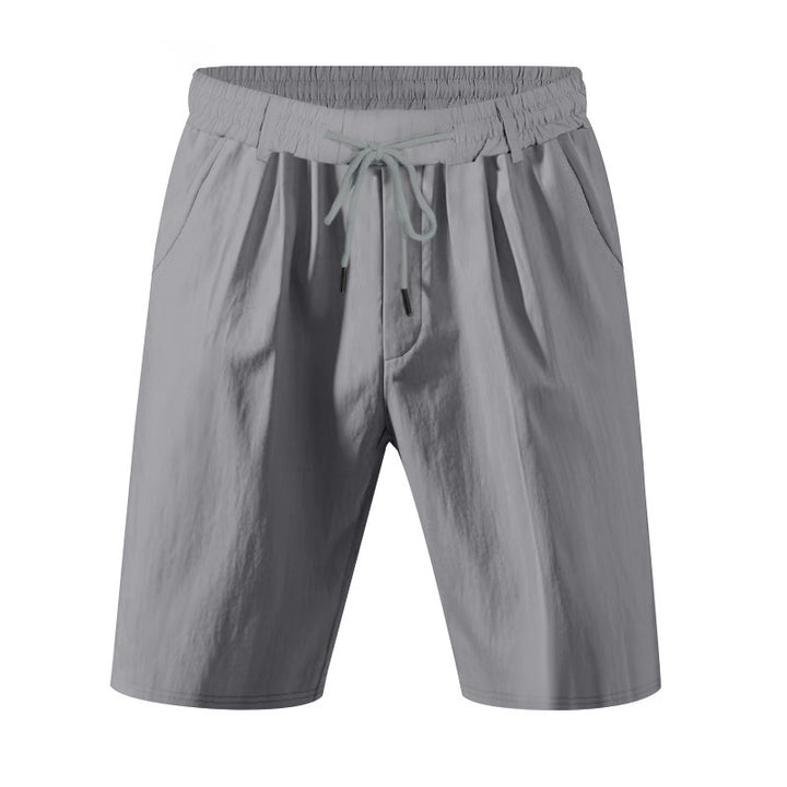 Men's knee-length lightweight functional shorts with elastic waistband, drawstring, and deep side pockets StylebySassy