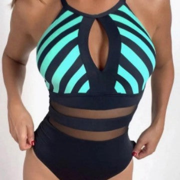 Women’s sporty swimsuit with fashionable mesh inserts StylebySassy
